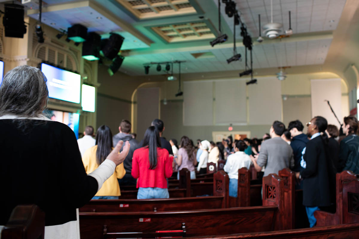 Youth and young adults engaged in worship and community
